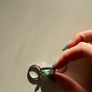 Spinelli mixed metals ring with blue sapphire diamonds
